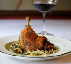 Plate Of Food And Glass Of Wine